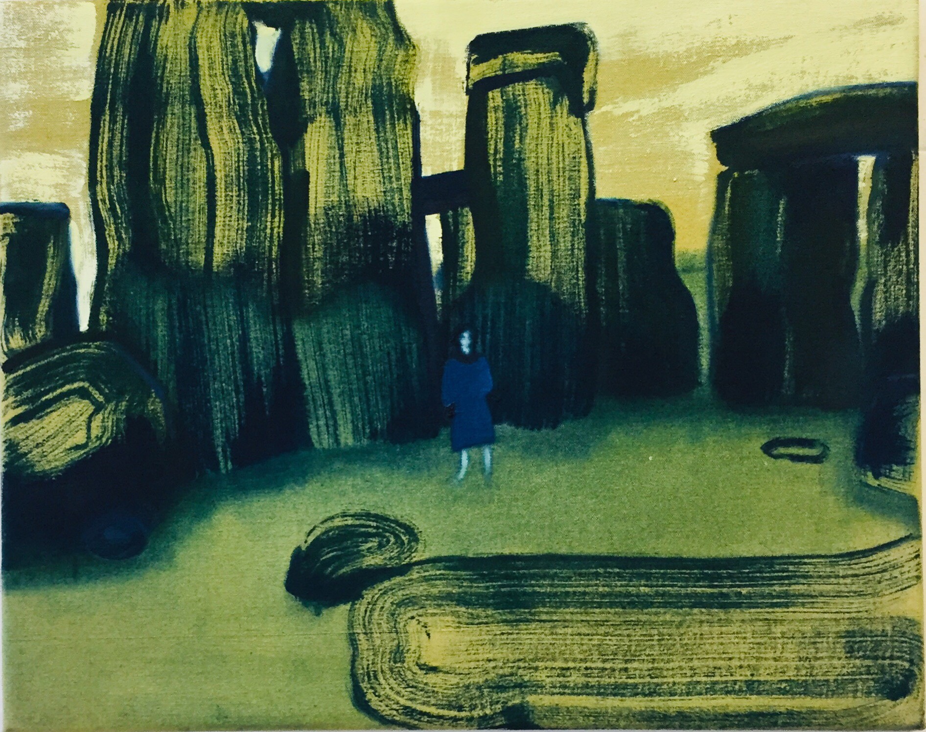 A scene of stonehenge painted onto an ochre canvas. The stones are painted in wide, strong strokes, reaching to the very top of the frame, leaving deep sea green and navy shadows. In the very centre of the frame, miniscule compared to the scale of the henge stones, a blue tinged figure with long dark hair, dressed in a large blue dress, stands facing the viewer directly. They are painted in much softer strokes than their surroundings.